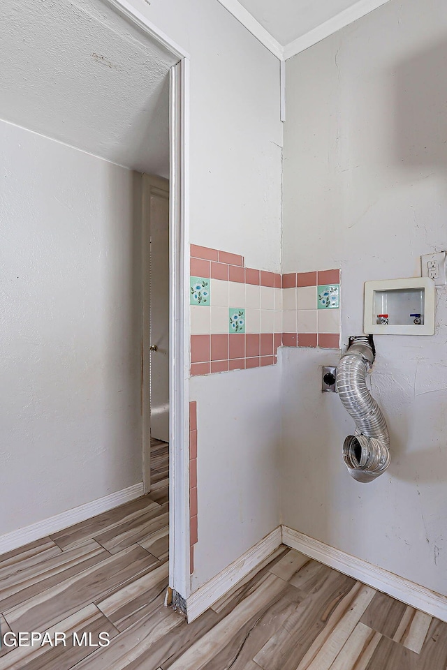 4330 Frankfort Ave, El Paso, TX 79903 - bathroom featuring wood finished floors and baseboards