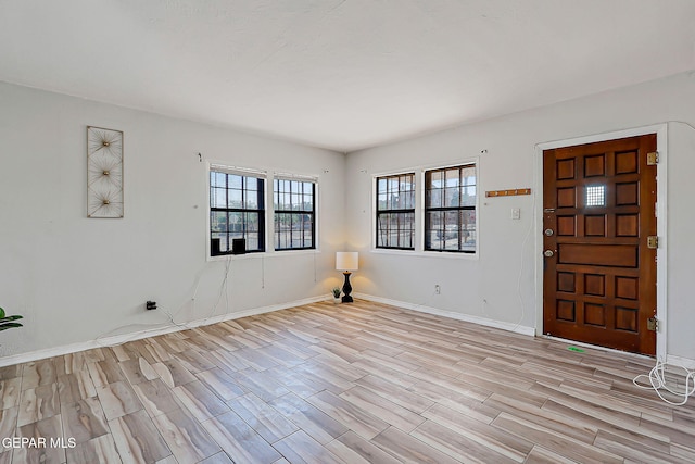 4330 Frankfort Ave, El Paso, TX 79903 - foyer entrance with light wood-style flooring and healthy amount of natural light