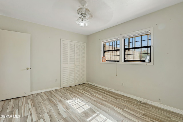4330 Frankfort Ave, El Paso, TX 79903 - unfurnished bedroom with a closet and wood finished floors