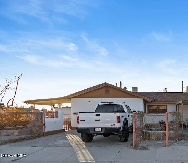 4330 Frankfort Ave, El Paso, TX 79903 - view of front of property featuring a fenced front yard, stucco siding, and a gate