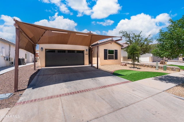 13597 Gatton St, El Paso, TX 79928 - view of front facade featuring asphalt driveway, stucco siding, and an attached garage
