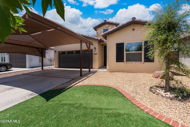 13597 Gatton St, El Paso, TX 79928 - view of front of home with stucco siding, a tiled roof, an attached garage, and driveway