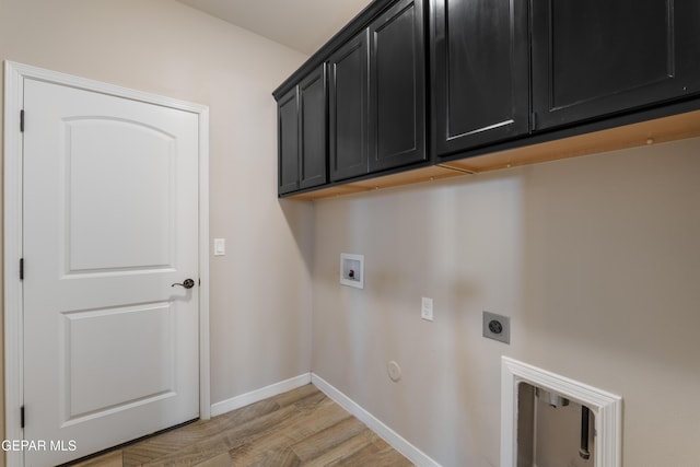13597 Gatton St, El Paso, TX 79928 - laundry room with cabinet space, electric dryer hookup, washer hookup, light wood-type flooring, and gas dryer hookup
