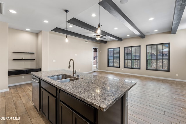 13597 Gatton St, El Paso, TX 79928 - kitchen with light wood-type flooring, beamed ceiling, dishwasher, decorative light fixtures, and a kitchen island with sink