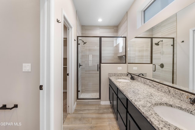 13597 Gatton St, El Paso, TX 79928 - full bath with a stall shower, a spacious closet, double vanity, and recessed lighting