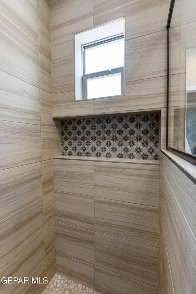13597 Gatton St, El Paso, TX 79928 - bathroom featuring tiled shower