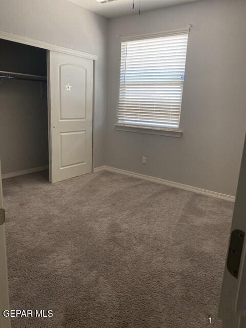 2813 Mike Price Dr, El Paso, TX 79938 - unfurnished bedroom with a closet and carpet