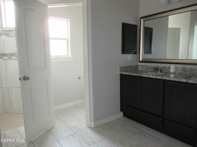 2813 Mike Price Dr, El Paso, TX 79938 - bathroom featuring vanity and marble finish flooring