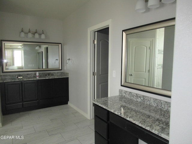 2813 Mike Price Dr, El Paso, TX 79938 - bathroom with vanity and baseboards
