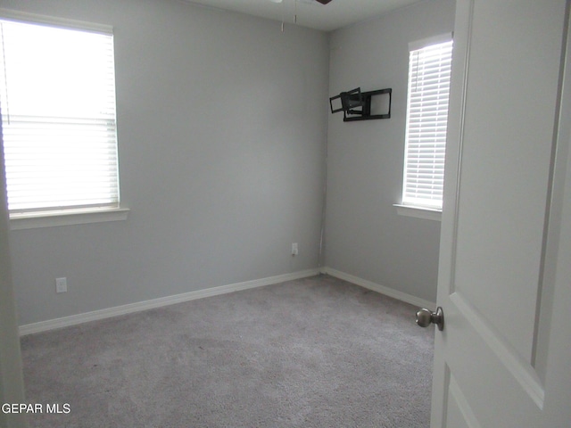 2813 Mike Price Dr, El Paso, TX 79938 - empty room featuring carpet flooring, healthy amount of natural light, and ceiling fan