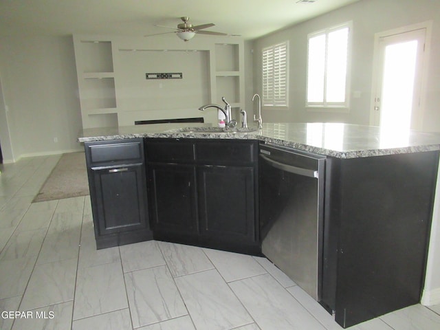 2813 Mike Price Dr, El Paso, TX 79938 - kitchen featuring dishwasher, a ceiling fan, light stone counters, and open floor plan