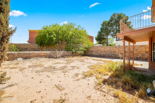 11960 Francis Scobee Dr, El Paso, TX 79936 - fenced backyard featuring a balcony