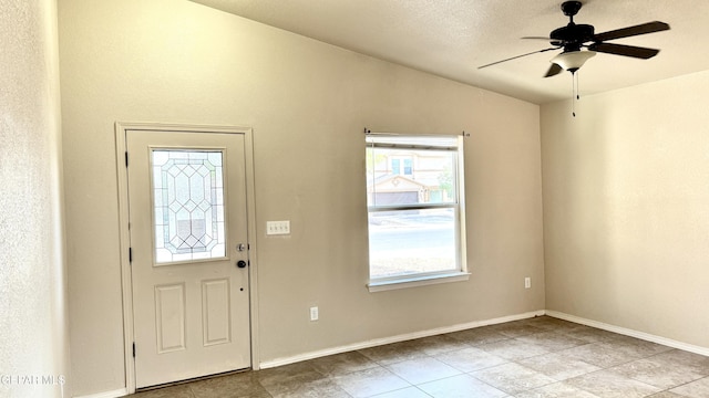 14207 Ranier Point Dr, El Paso, TX 79938 - foyer entrance with vaulted ceiling, ceiling fan, and tile patterned flooring