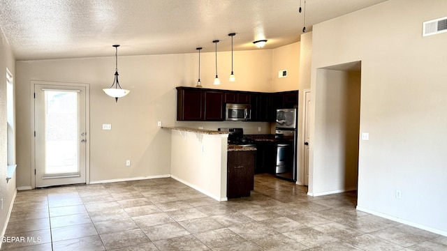 14207 Ranier Point Dr, El Paso, TX 79938 - kitchen featuring stainless steel microwave, range, a peninsula, fridge, and lofted ceiling