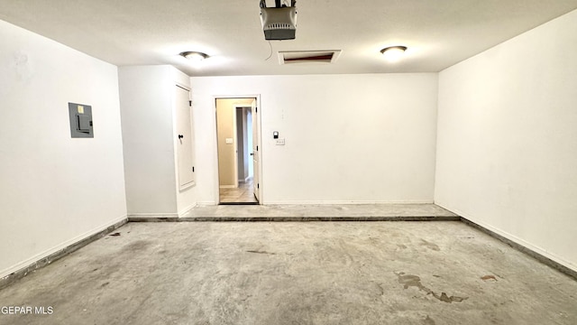14207 Ranier Point Dr, El Paso, TX 79938 - garage with a garage door opener and electric panel