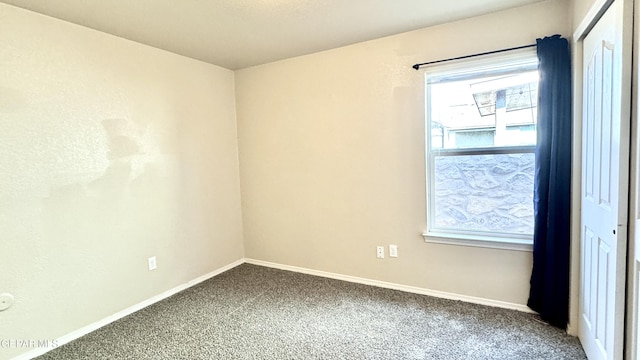 14207 Ranier Point Dr, El Paso, TX 79938 - unfurnished room featuring carpet floors and healthy amount of natural light