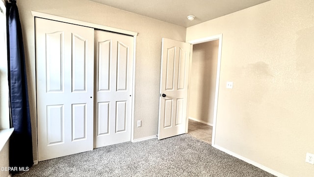 14207 Ranier Point Dr, El Paso, TX 79938 - unfurnished bedroom with carpet flooring and a closet