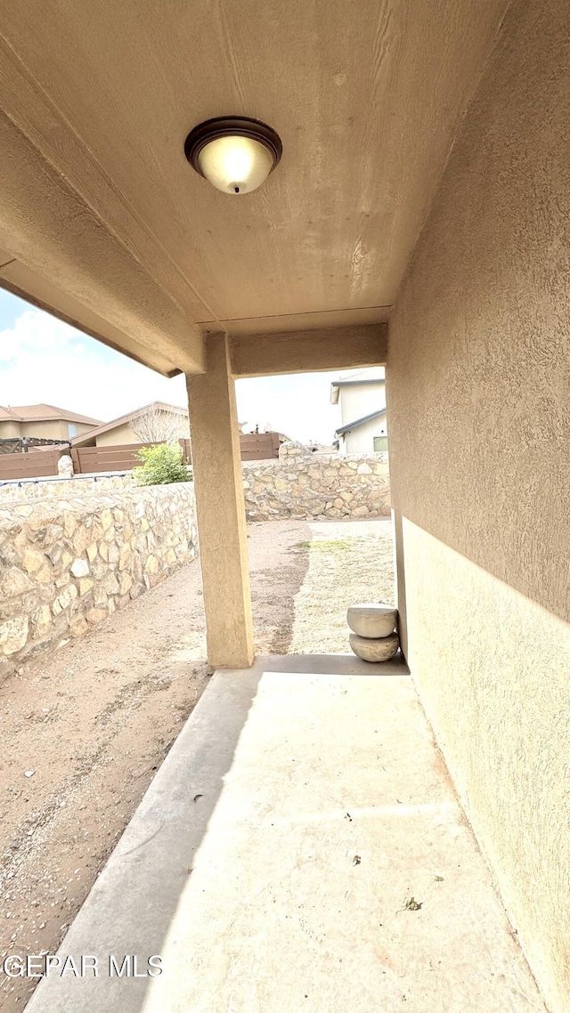 14207 Ranier Point Dr, El Paso, TX 79938 - fenced backyard featuring a patio