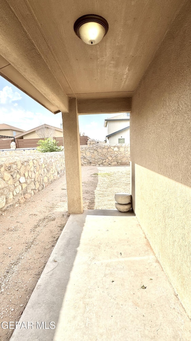 14207 Ranier Point Dr, El Paso, TX 79938 - fenced backyard with a patio