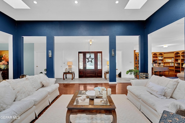 1349 Belvidere St, El Paso, TX 79912 - living room with a skylight, recessed lighting, and wood finished floors