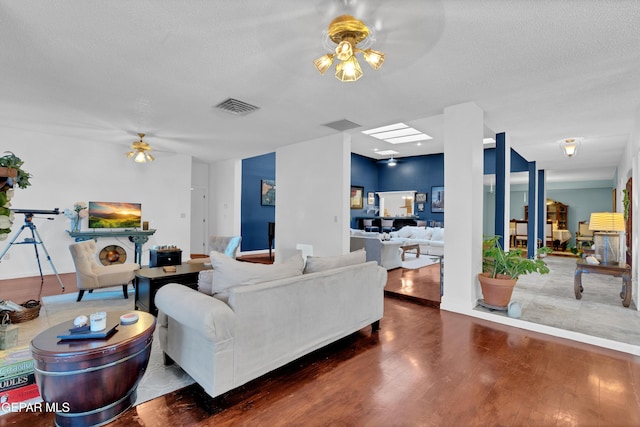1349 Belvidere St, El Paso, TX 79912 - living room featuring ceiling fan and wood finished floors