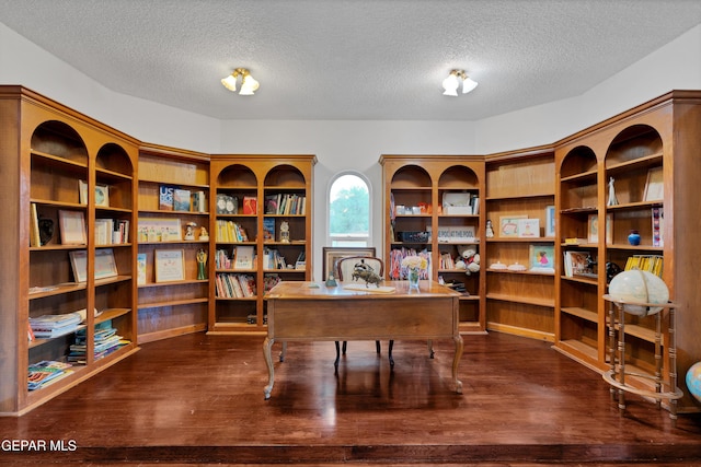 1349 Belvidere St, El Paso, TX 79912 - office area with a textured ceiling and dark wood-style floors