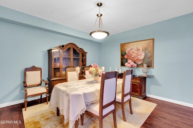 1349 Belvidere St, El Paso, TX 79912 - dining room featuring wood finished floors and baseboards