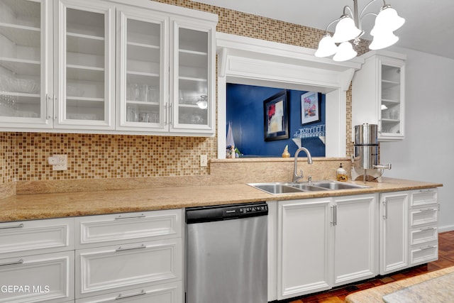 1349 Belvidere St, El Paso, TX 79912 - kitchen with dishwasher, white cabinets, and a chandelier