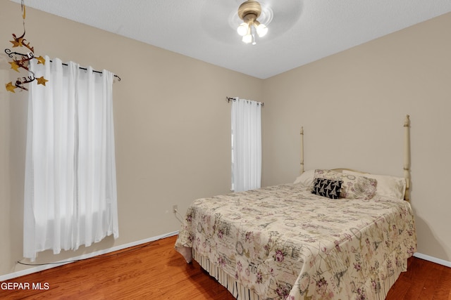 1349 Belvidere St, El Paso, TX 79912 - bedroom with wood finished floors and a ceiling fan