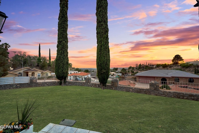 1349 Belvidere St, El Paso, TX 79912 - yard at dusk featuring a fenced backyard