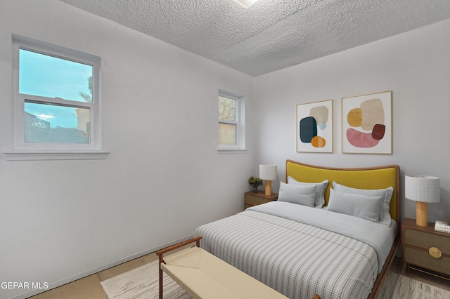 1349 Belvidere St, El Paso, TX 79912 - bedroom with a textured ceiling