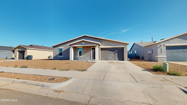 14661 Holly Blue Ave, Horizon City, TX 79928 - ranch-style home with a garage, concrete driveway, and stucco siding