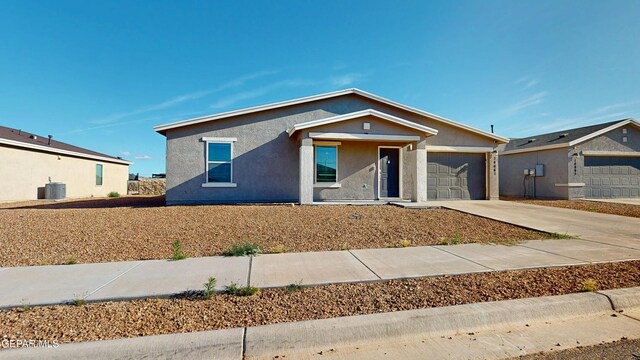 14661 Holly Blue Ave, Horizon City, TX 79928 - ranch-style home with a garage, concrete driveway, and stucco siding