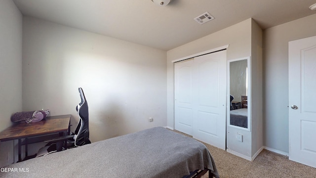 14661 Holly Blue Ave, Horizon City, TX 79928 - carpeted bedroom with a closet and baseboards