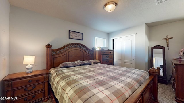 14661 Holly Blue Ave, Horizon City, TX 79928 - bedroom featuring dark colored carpet and a closet