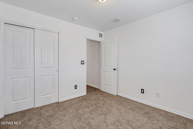 3143 Red Maple, El Paso, TX 79938 - unfurnished bedroom featuring carpet flooring and a closet