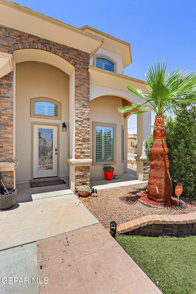 3143 Red Maple, El Paso, TX 79938 - entrance to property featuring stucco siding and stone siding