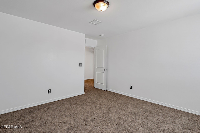 3143 Red Maple, El Paso, TX 79938 - spare room with dark carpet and baseboards