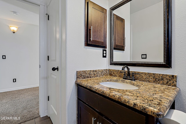 3143 Red Maple, El Paso, TX 79938 - bathroom featuring vanity and baseboards