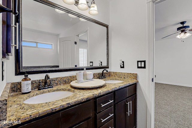 3143 Red Maple, El Paso, TX 79938 - full bathroom featuring double vanity and a ceiling fan
