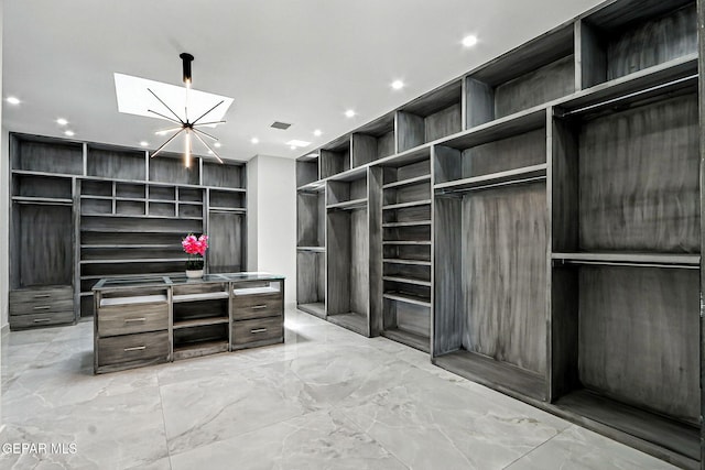 6325 Camino Pinon, El Paso, TX 79932 - spacious closet with light marble finish floors and a skylight