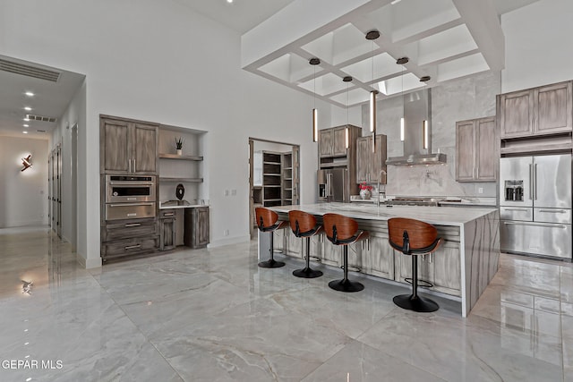 6325 Camino Pinon, El Paso, TX 79932 - kitchen with stainless steel appliances, a towering ceiling, coffered ceiling, wall chimney range hood, and open shelves