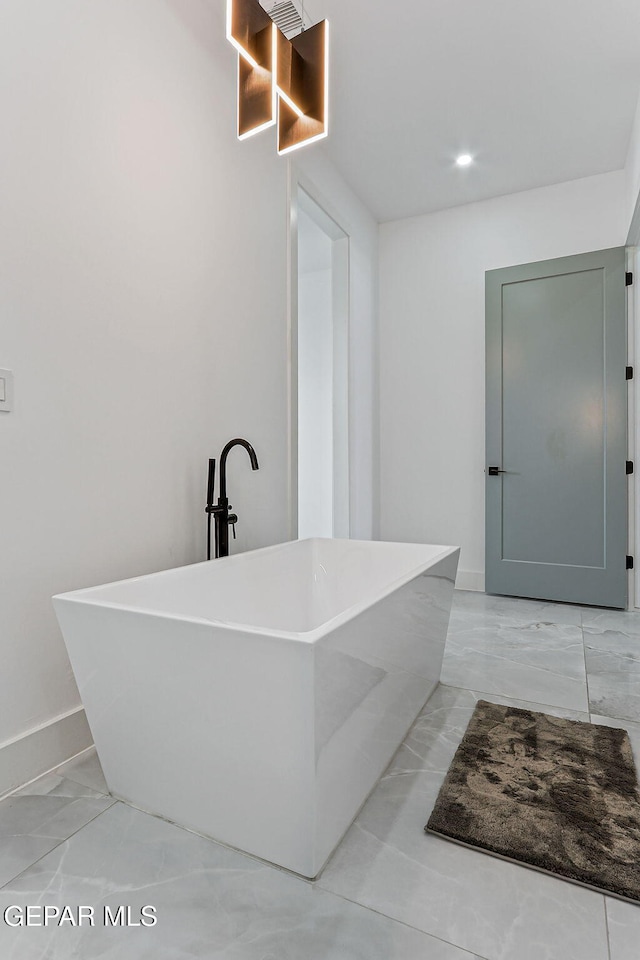 6325 Camino Pinon, El Paso, TX 79932 - full bath featuring marble finish floors and a freestanding tub