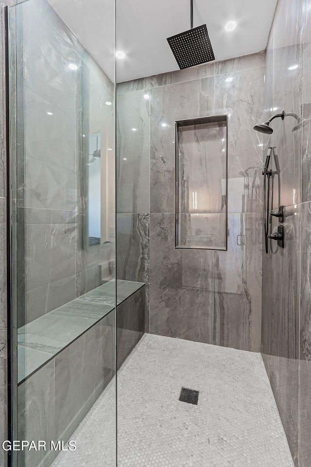 6325 Camino Pinon, El Paso, TX 79932 - bathroom featuring a marble finish shower