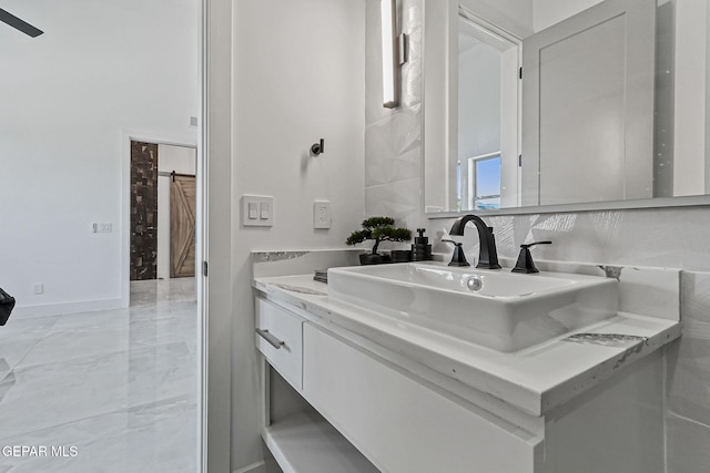 6325 Camino Pinon, El Paso, TX 79932 - bathroom with vanity and baseboards