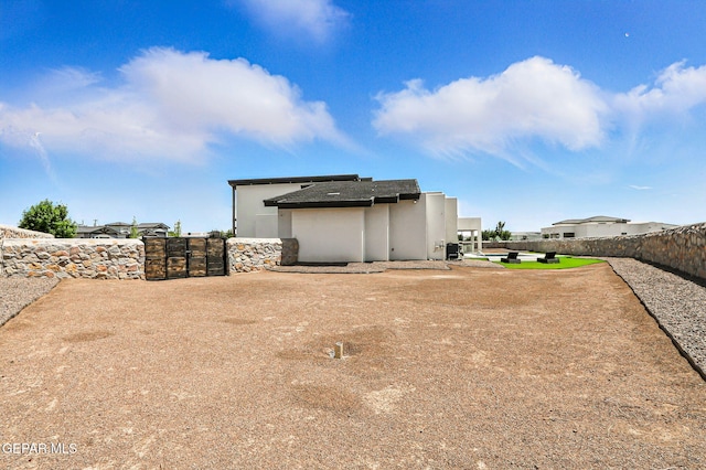6325 Camino Pinon, El Paso, TX 79932 - rear view of house with stucco siding