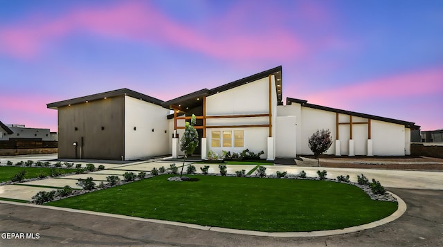 6325 Camino Pinon, El Paso, TX 79932 - view of front of property featuring a front yard and stucco siding