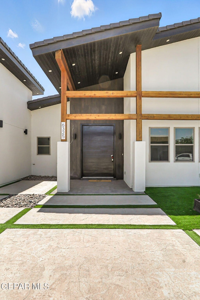 6325 Camino Pinon, El Paso, TX 79932 - view of exterior entry with stucco siding