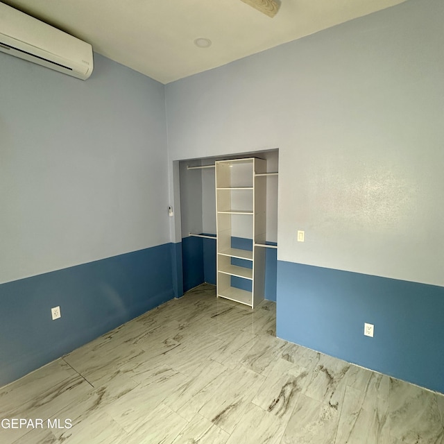 3026 Findley Ave, El Paso, TX 79905 - unfurnished bedroom featuring a wall mounted AC
