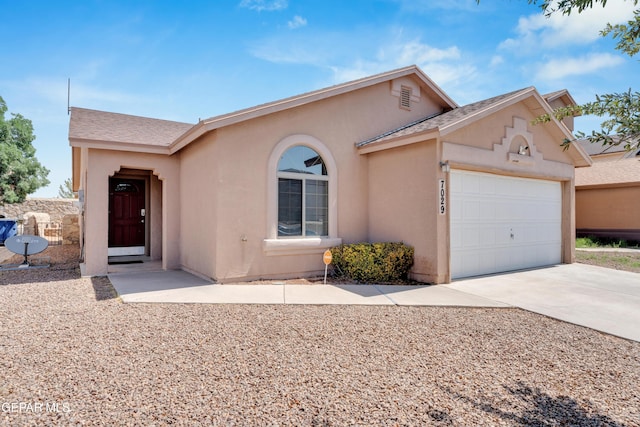 7029 Copper Canyon Dr, El Paso, TX 79934 - ranch-style house featuring stucco siding, a garage, and concrete driveway